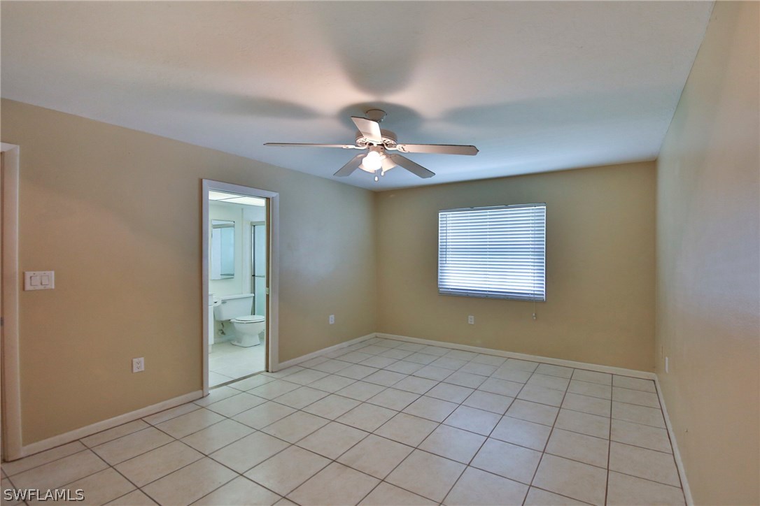17520 Lebanon Road Fort Myers, FL 33967 - Photo 8 of 15 a view of an empty room with a window