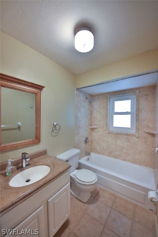 17520 Lebanon Road Fort Myers, FL 33967 - Photo 10 of 15 a bathroom with a sink a toilet and a mirror
