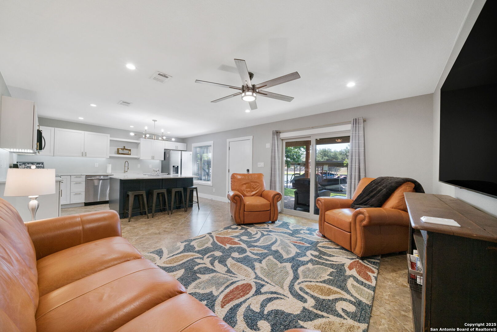 1500 Ranch Road 1431, Unit 103 Kingsland, TX 78639 - Photo 18 of 29 a living room with furniture and a large window