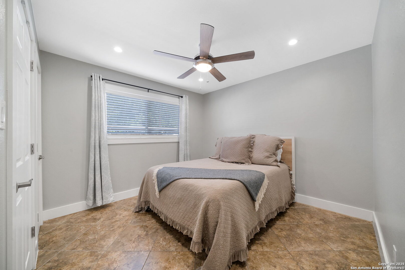 1500 Ranch Road 1431, Unit 103 Kingsland, TX 78639 - Photo 20 of 29 a bed room with a bed and a window