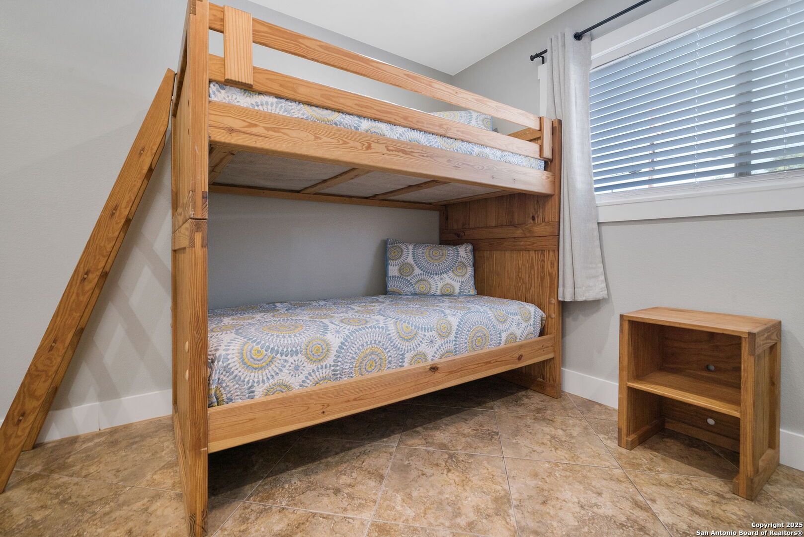1500 Ranch Road 1431, Unit 103 Kingsland, TX 78639 - Photo 22 of 29 a bedroom with a bed and a window