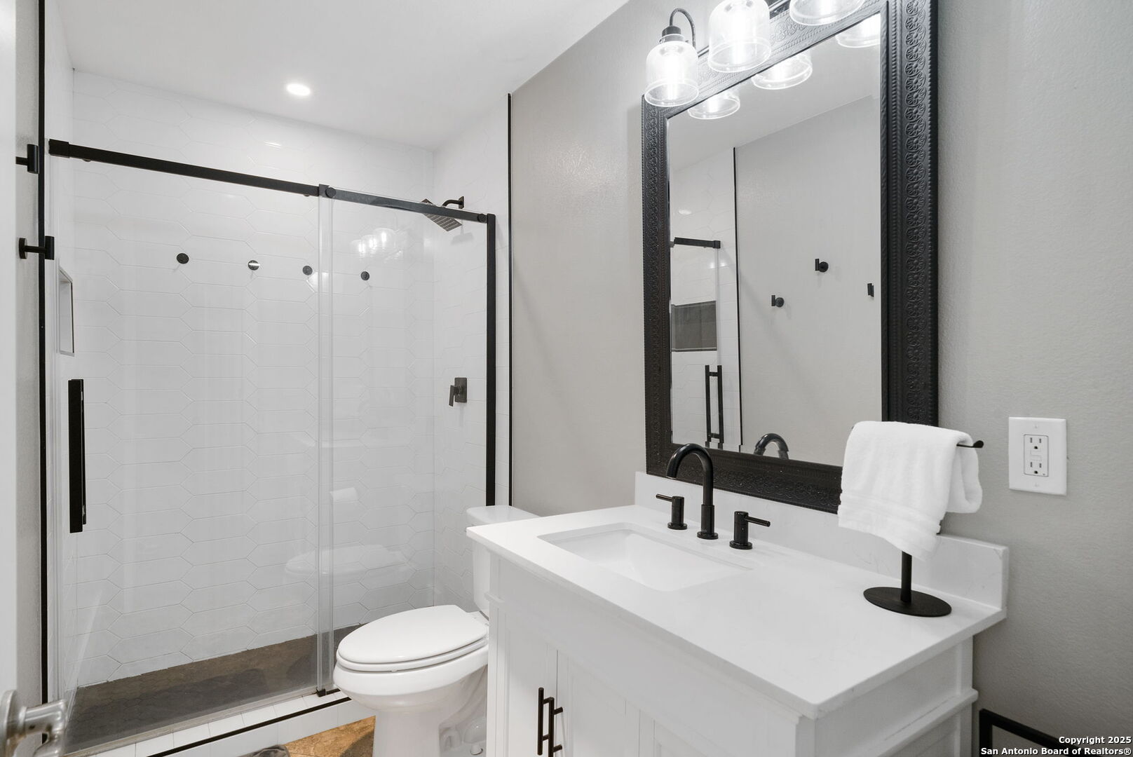 1500 Ranch Road 1431, Unit 103 Kingsland, TX 78639 - Photo 7 of 29 a bathroom with a sink toilet a mirror and shower