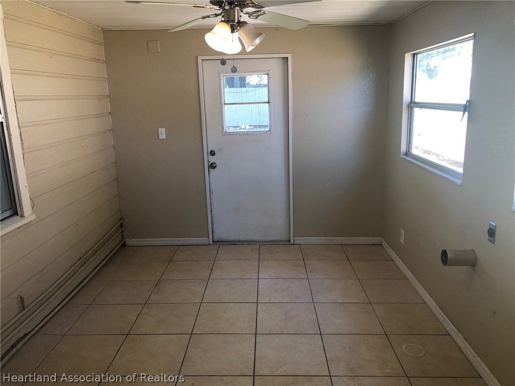 313 Heard Bridge Road Wauchula, FL 33873 - Photo 16 of 20 an empty room with chandelier fan