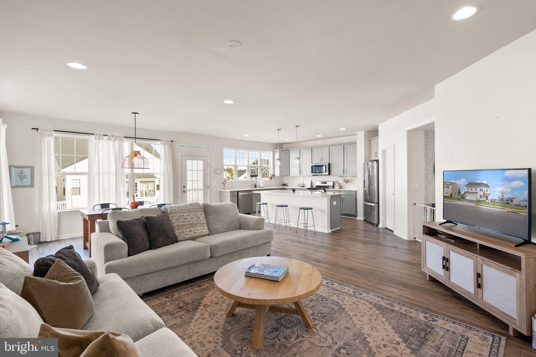 131 Interlace Way Stephenson, VA 22656 - Photo 12 of 71 a living room with furniture and a flat screen tv