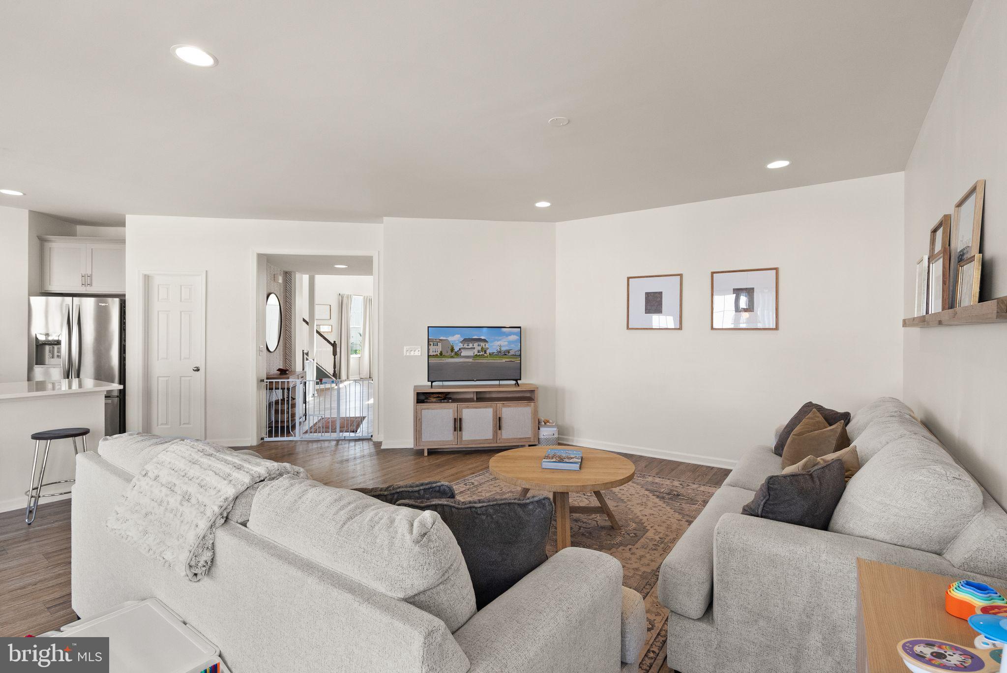 131 Interlace Way Stephenson, VA 22656 - Photo 13 of 71 a living room with furniture and a flat screen tv