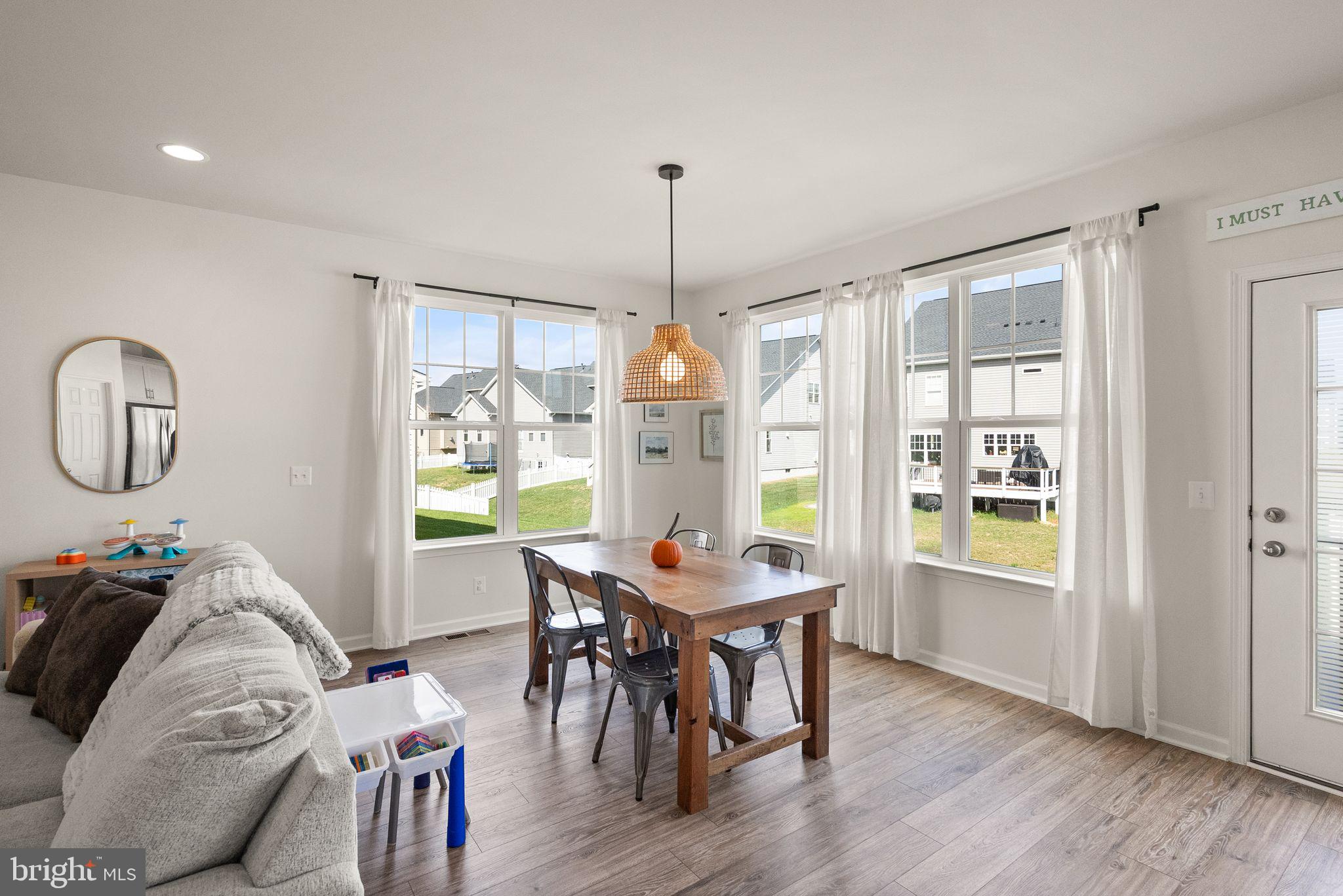 131 Interlace Way Stephenson, VA 22656 - Photo 15 of 71 a dining room with furniture window wooden floor