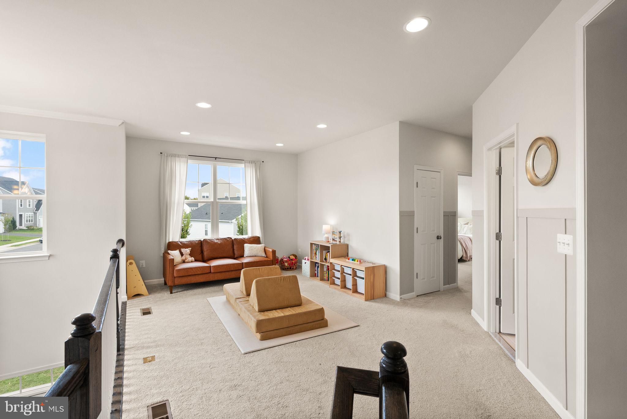 131 Interlace Way Stephenson, VA 22656 - Photo 23 of 71 a living room with furniture and a window