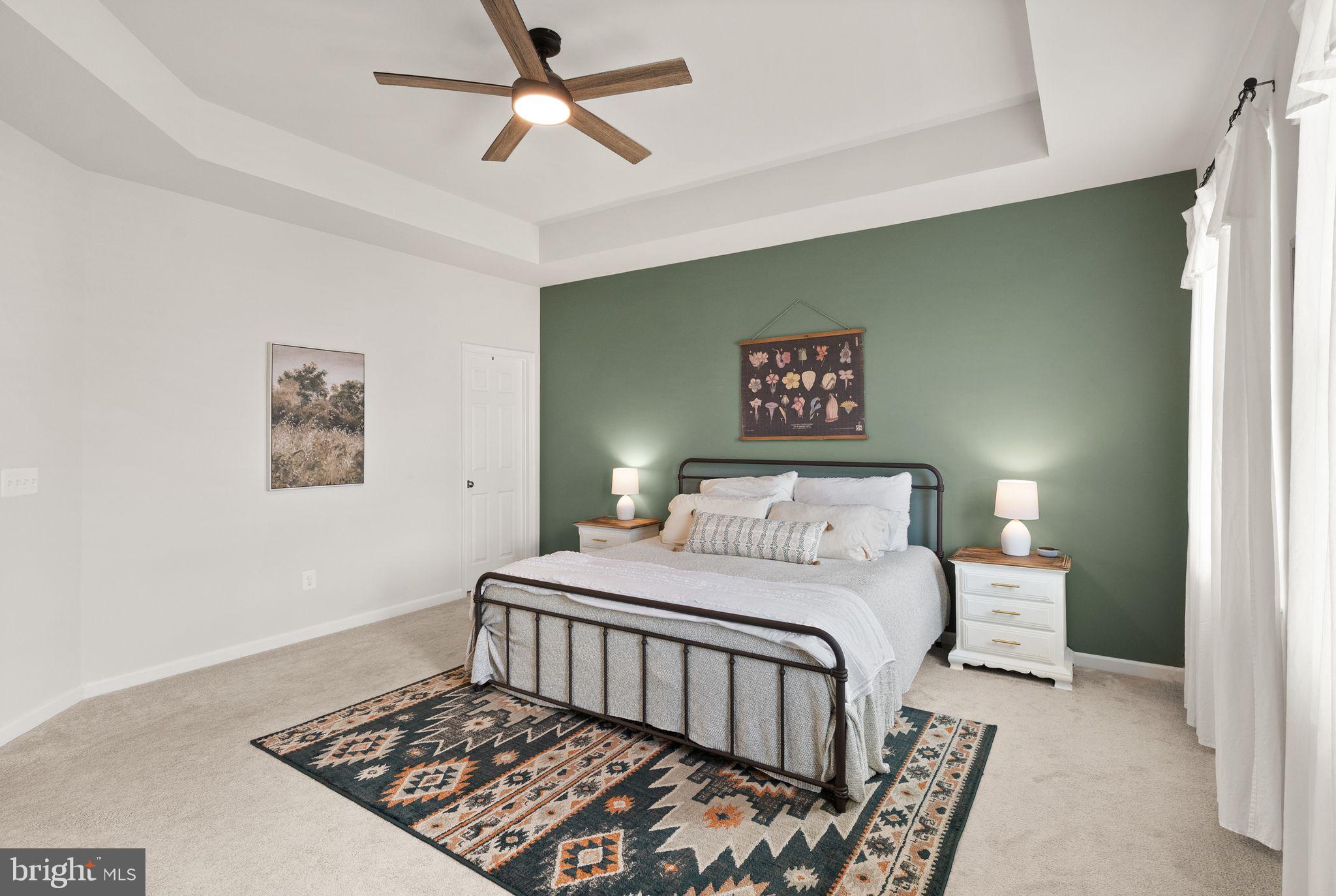 131 Interlace Way Stephenson, VA 22656 - Photo 28 of 71 a bedroom with a bed and a chandelier