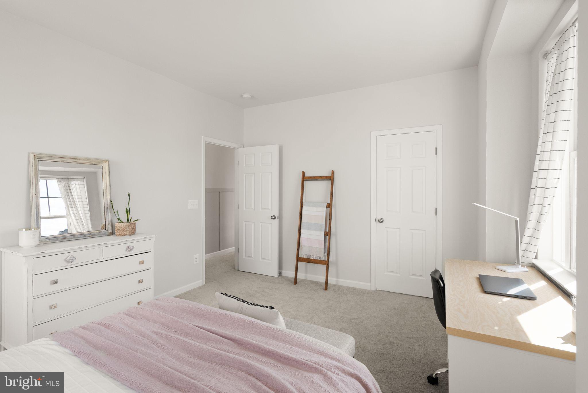 131 Interlace Way Stephenson, VA 22656 - Photo 34 of 71 a bedroom with a bed and a dresser