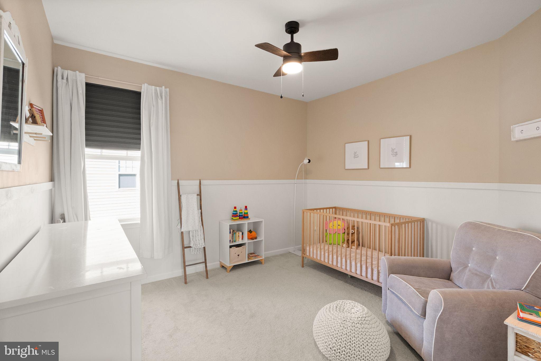 131 Interlace Way Stephenson, VA 22656 - Photo 36 of 71 a living room with furniture and a baby crib