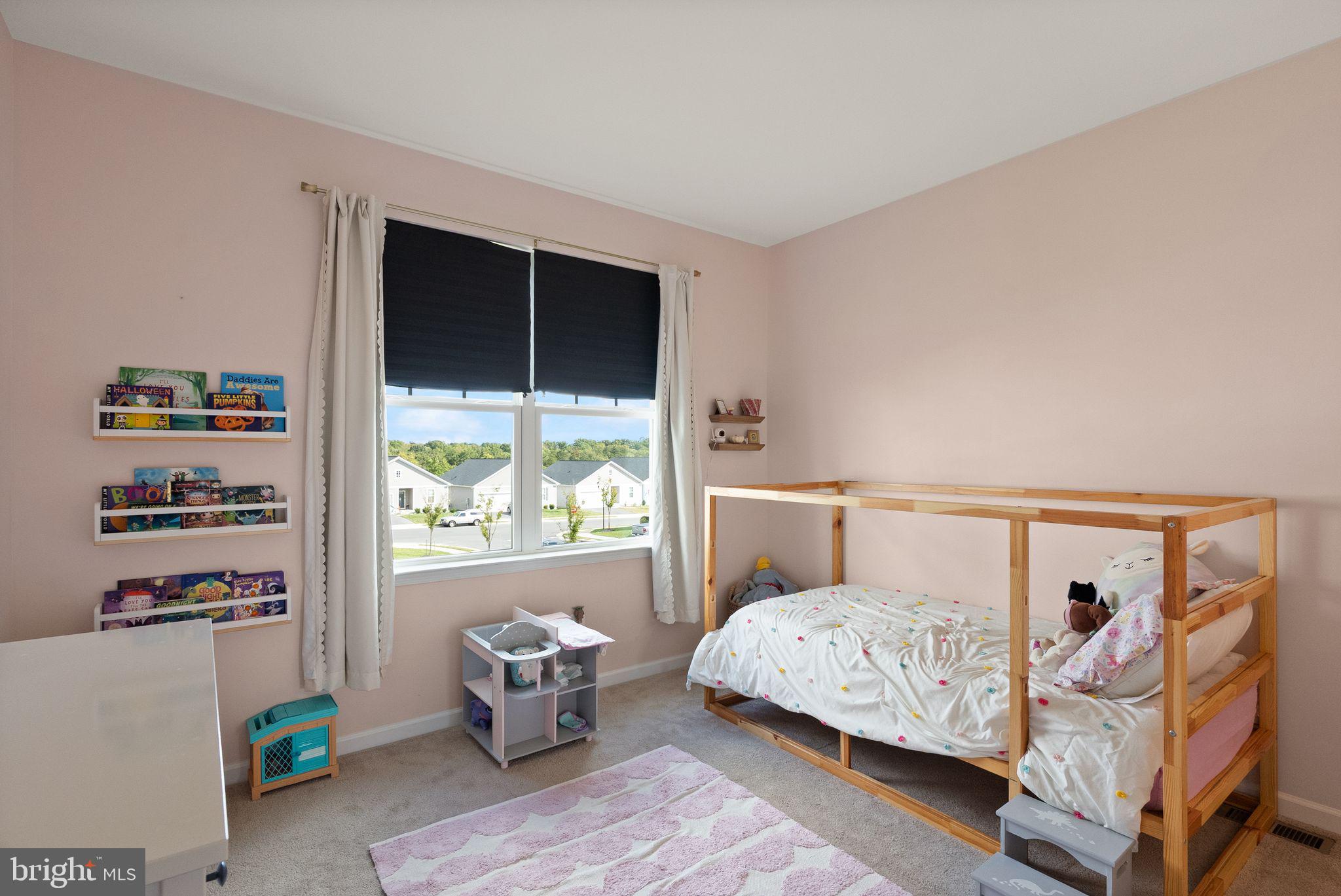 131 Interlace Way Stephenson, VA 22656 - Photo 38 of 71 a bedroom with furniture and a window