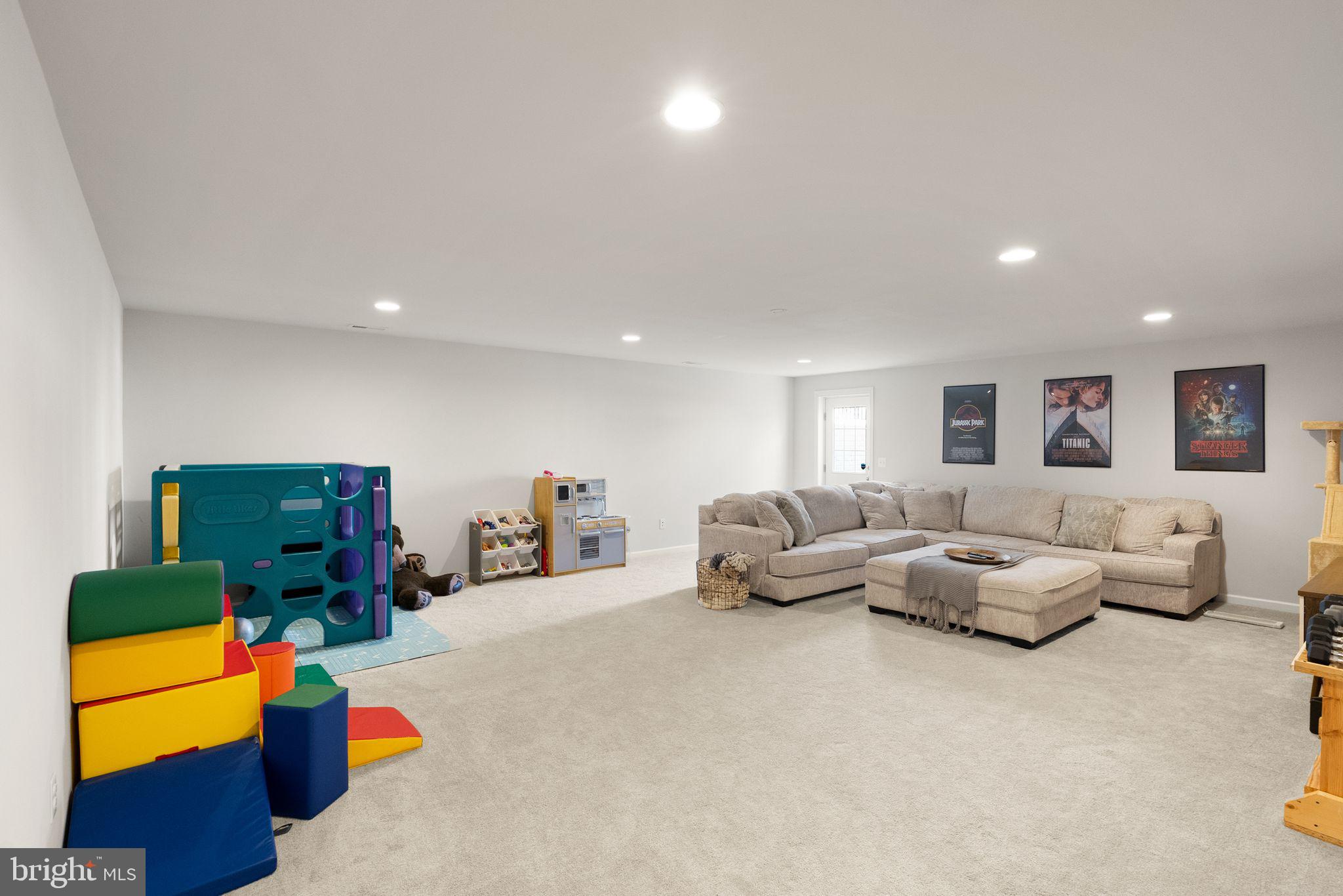 131 Interlace Way Stephenson, VA 22656 - Photo 42 of 71 a living room with furniture and a couch