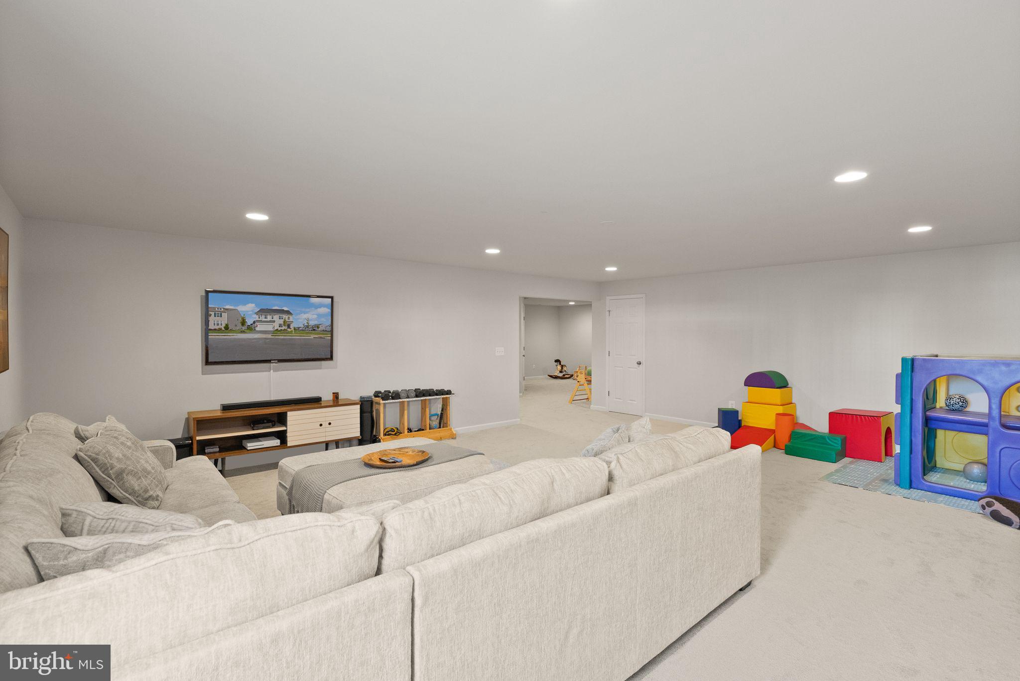 131 Interlace Way Stephenson, VA 22656 - Photo 45 of 71 a living room with furniture and a couch