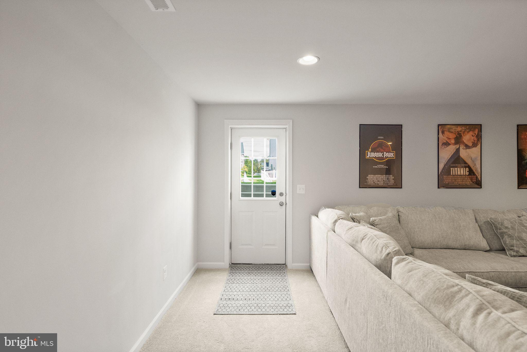 131 Interlace Way Stephenson, VA 22656 - Photo 47 of 71 a living room with furniture and a couch