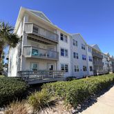 a view of a building with a street
