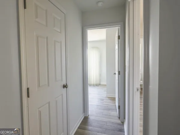 a view of a bathroom from the hallway