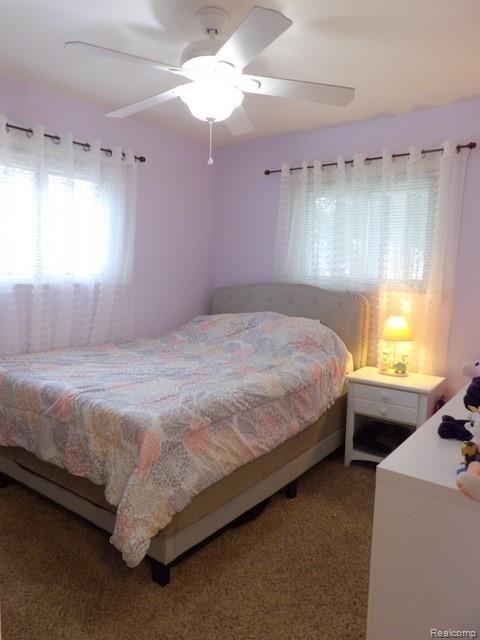 7911 Merrick Street Taylor, MI 48180 - Photo 27 of 42 27. MAIN LEVEL BEDROOM #1 FEATURES A CEILING FAN AND NEUTRAL PLUSH CARPET!