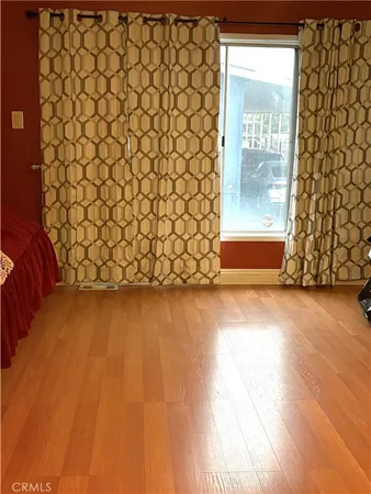a view of a wooden door and shower
