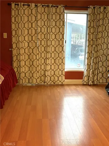 a view of a wooden door and shower