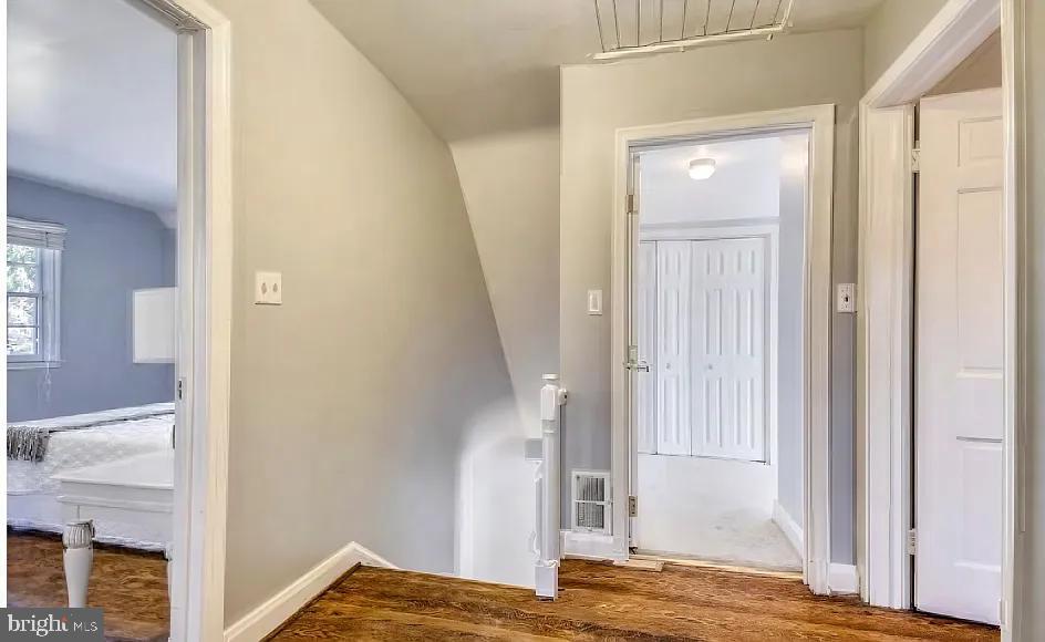 5806 Kenmore Road Baltimore, MD 21210 - Photo 15 of 35 a view of bedroom with wooden floor