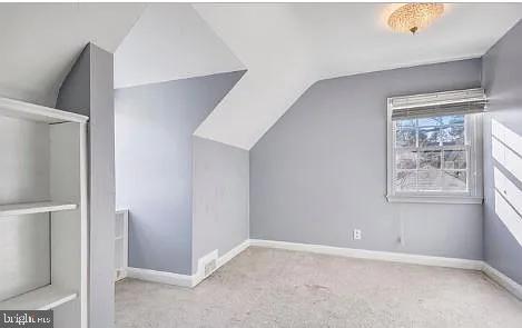 5806 Kenmore Road Baltimore, MD 21210 - Photo 18 of 35 a view of an empty room with a window