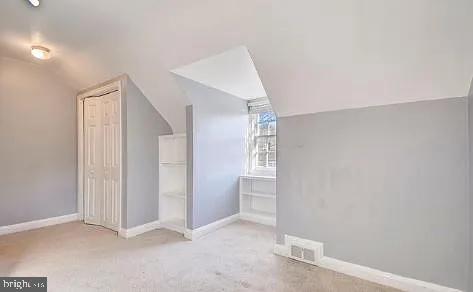 5806 Kenmore Road Baltimore, MD 21210 - Photo 20 of 35 an empty room with windows