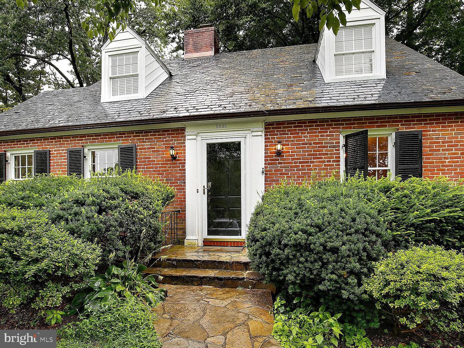 5806 Kenmore Road Baltimore, MD 21210 - Photo 3 of 35 front view of a house with potted plants