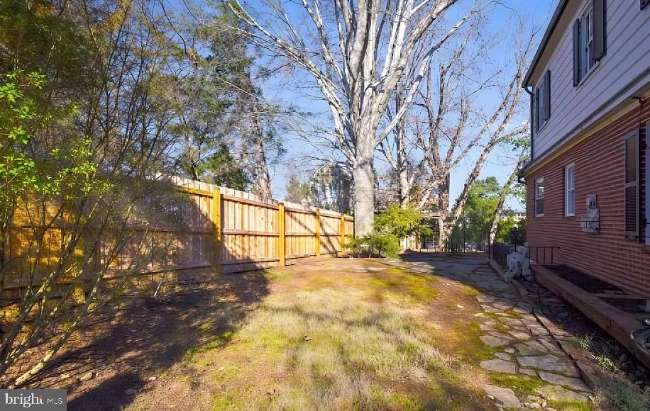 5806 Kenmore Road Baltimore, MD 21210 - Photo 32 of 35 a view of yard with wooden fence