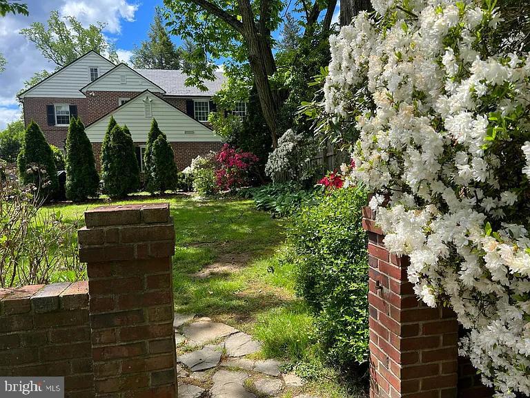 5806 Kenmore Road Baltimore, MD 21210 - Photo 33 of 35 a front view of a house with a yard
