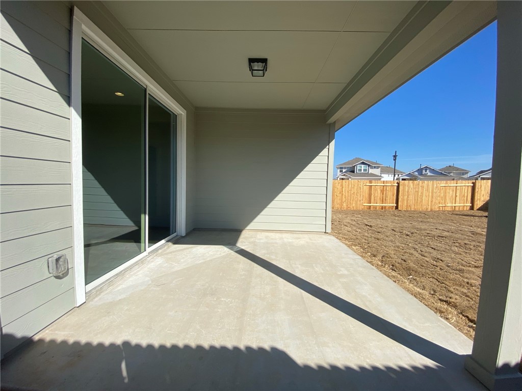384 Gaida Loop Georgetown, TX 78628 - Photo 17 of 20 Enjoy relaxing or BBQ under your covered back pati.