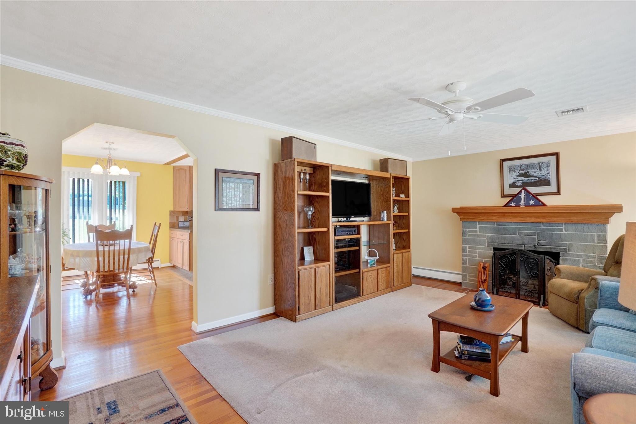 2320 Sycamore Road York, PA 17408 - Photo 2 of 26 a living room with furniture and a fireplace