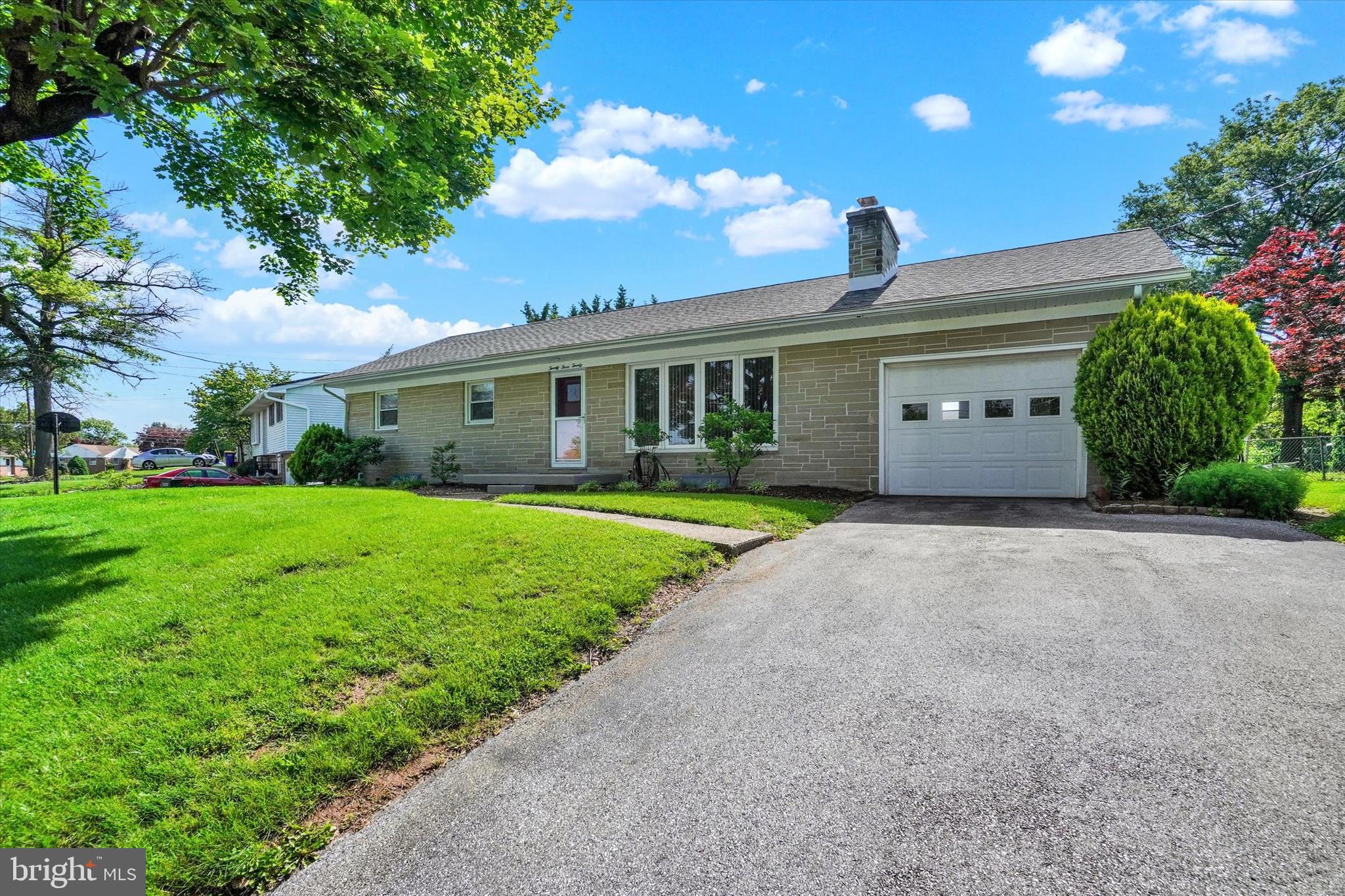 2320 Sycamore Road York, PA 17408 - Photo 23 of 26 a front view of house with yard and green space
