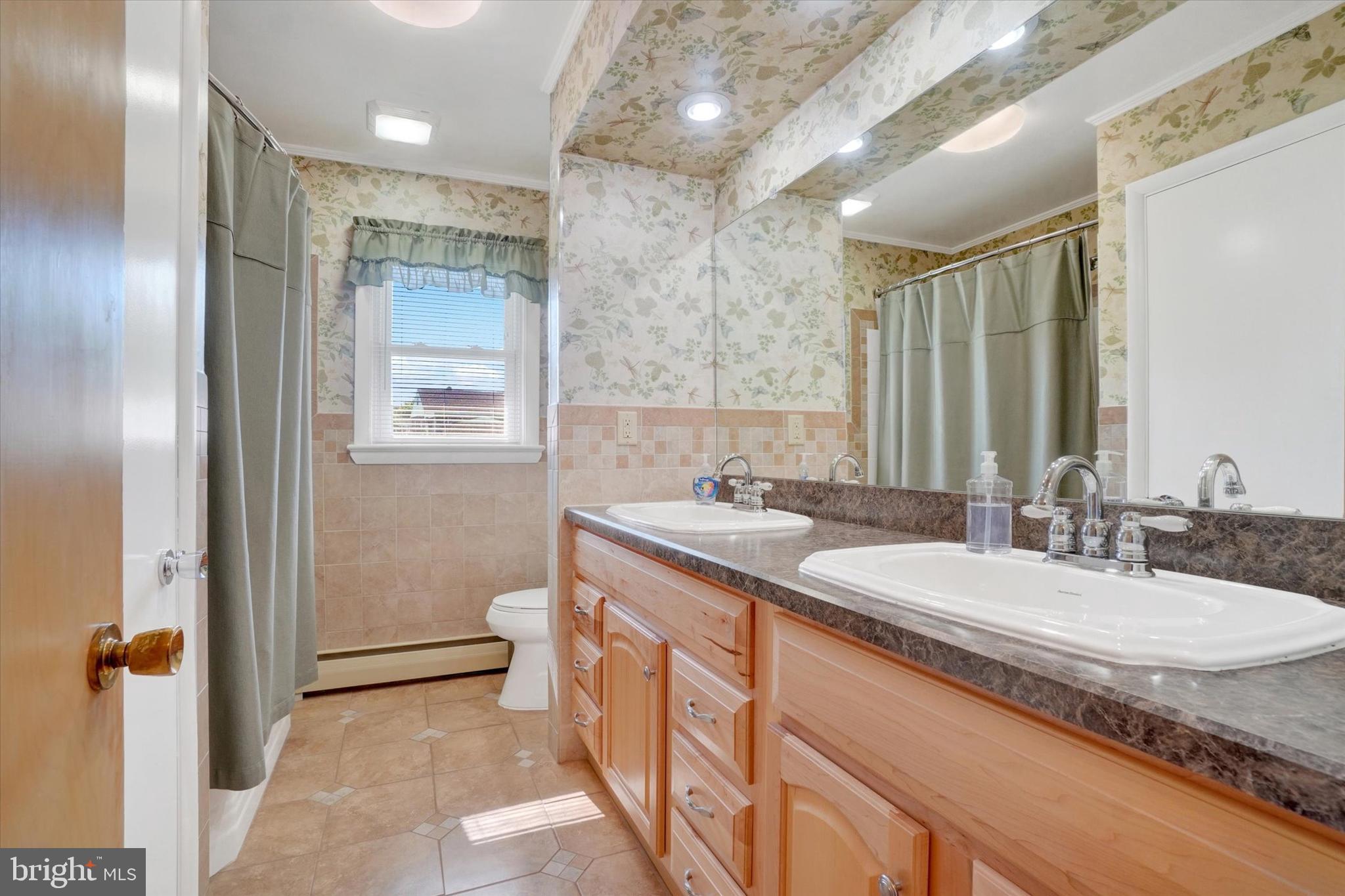 2320 Sycamore Road York, PA 17408 - Photo 10 of 26 a bathroom with a granite countertop sink mirror and double