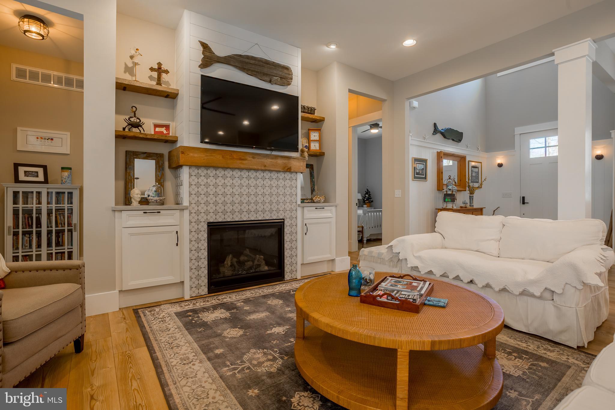 10 Haven Drive Georgetown, DE 19947 - Photo 23 of 76 a living room with furniture and a fireplace