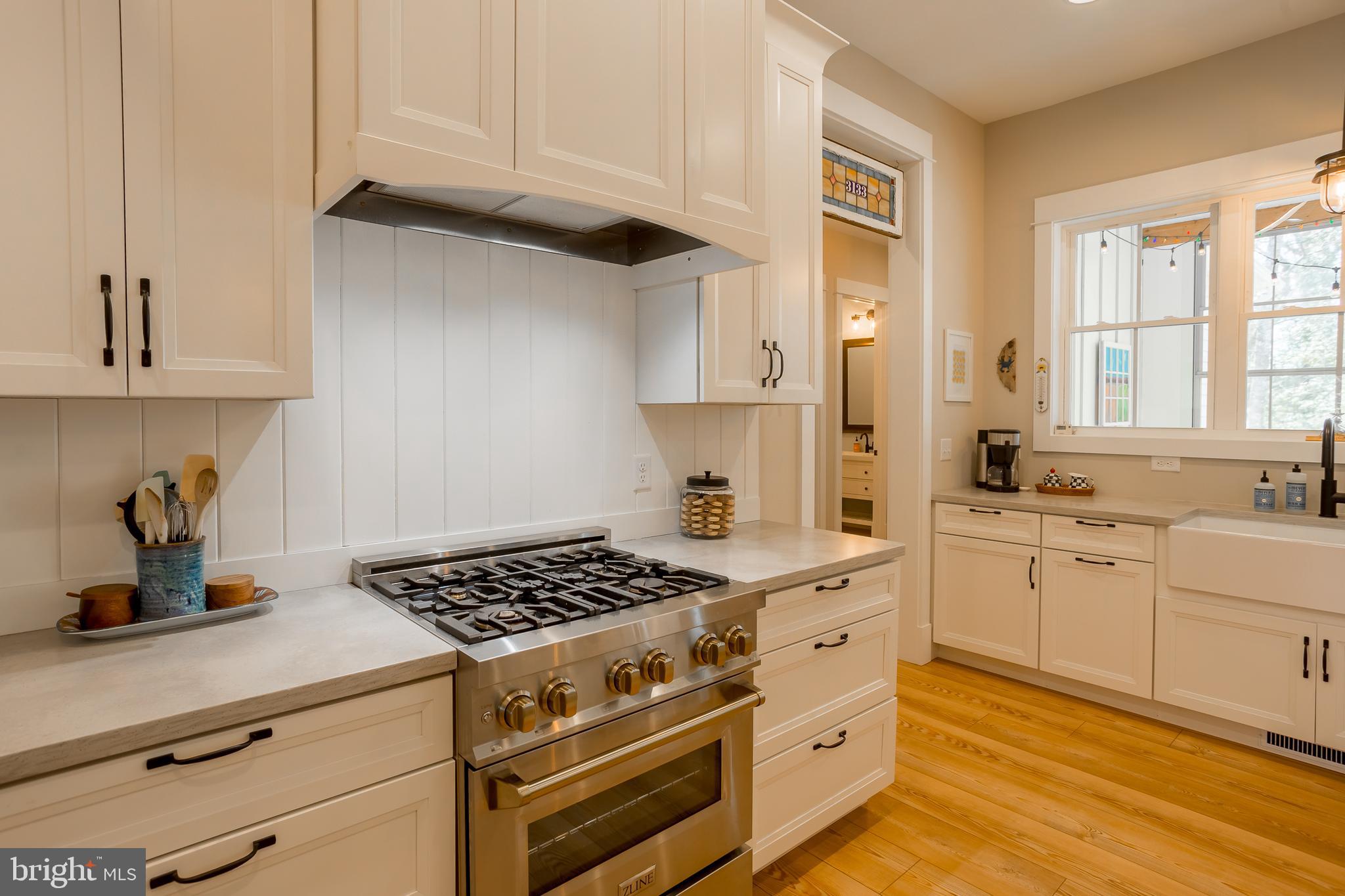 10 Haven Drive Georgetown, DE 19947 - Photo 28 of 76 a kitchen with cabinets appliances a sink and a window