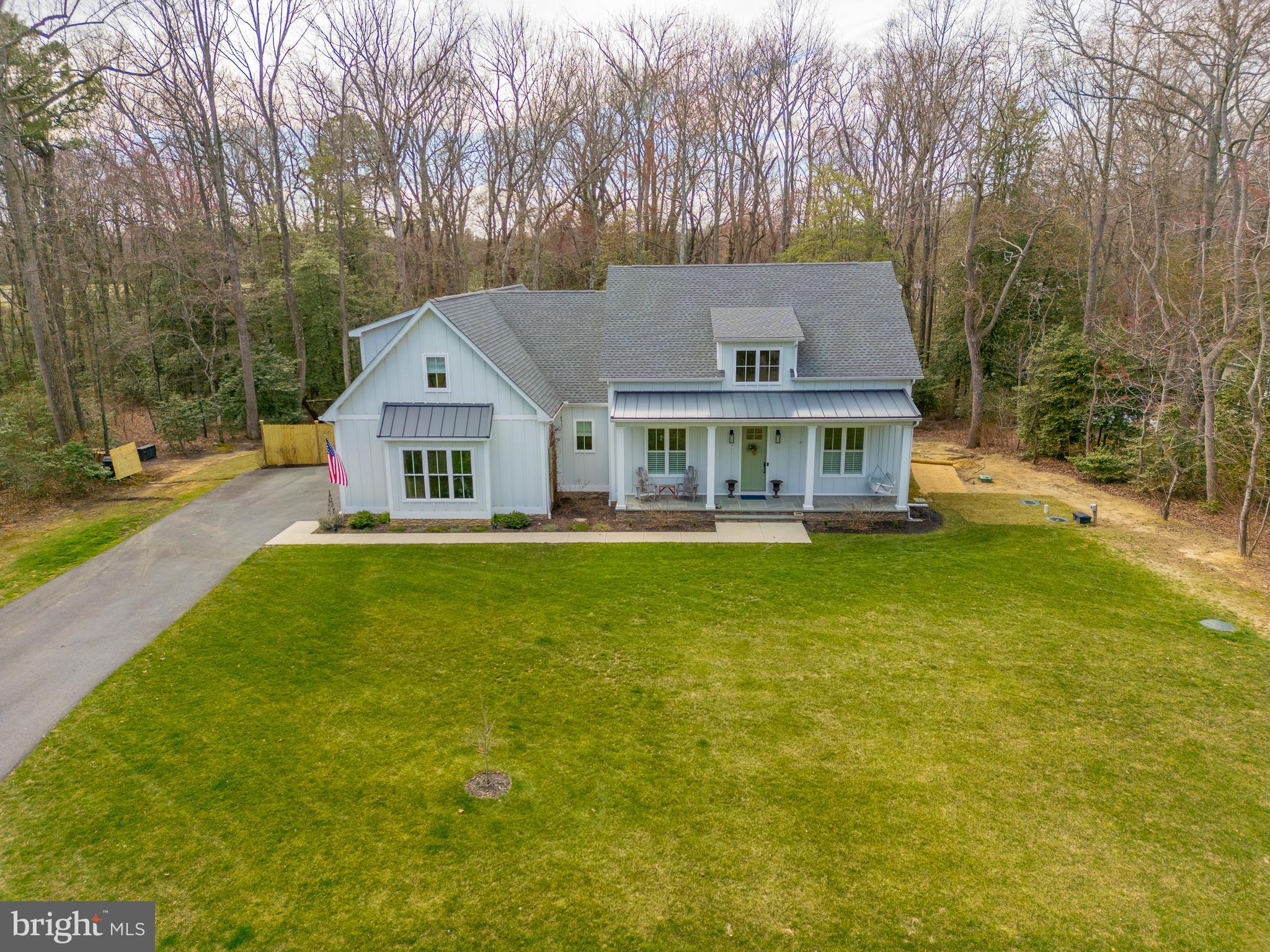 10 Haven Drive Georgetown, DE 19947 - Photo 3 of 76 a front view of house with yard and swimming pool