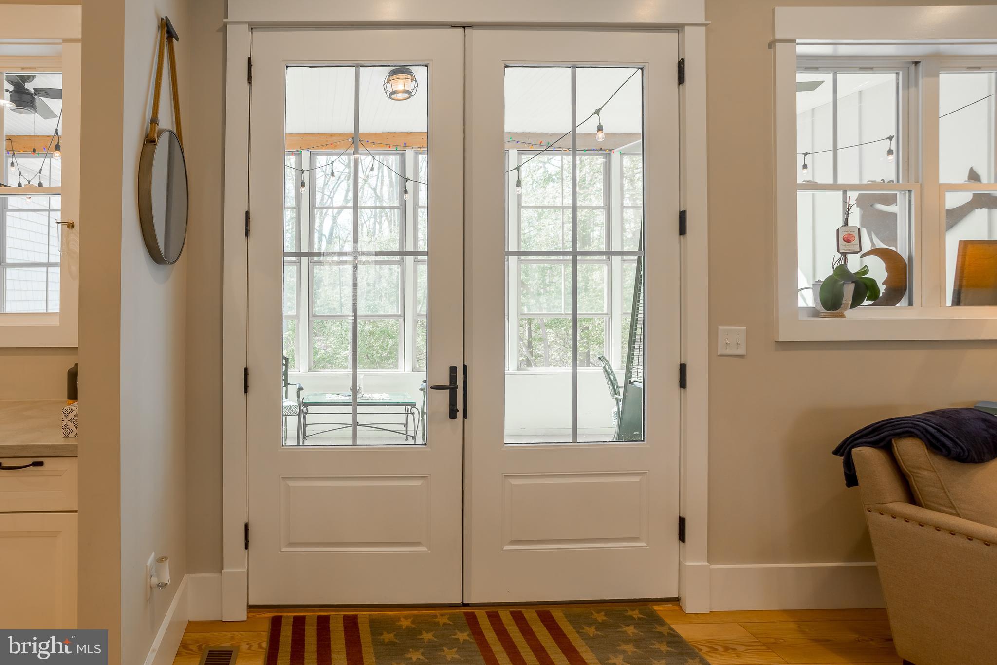 10 Haven Drive Georgetown, DE 19947 - Photo 32 of 76 a view of an empty room with a window and wooden floor