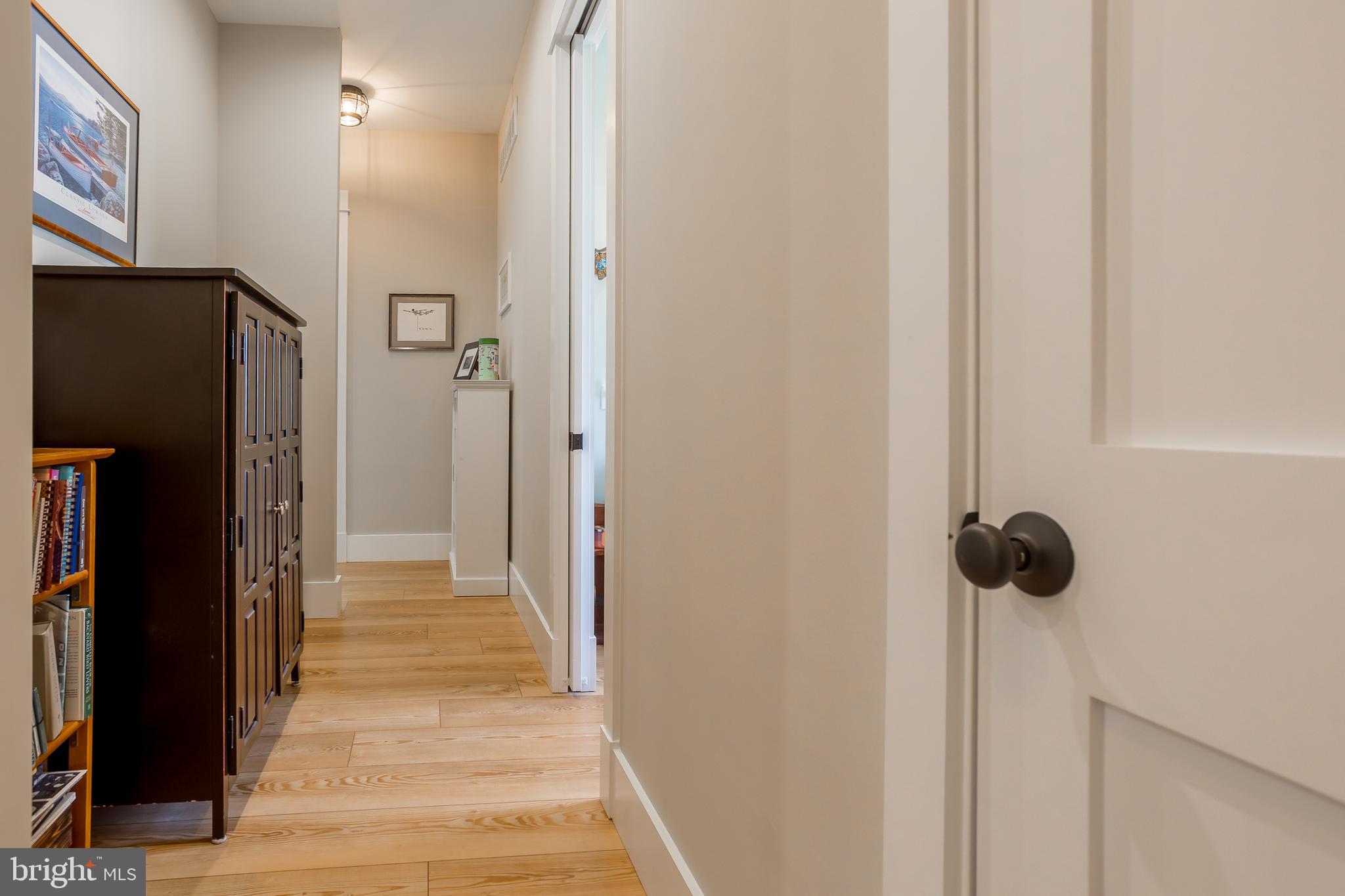 10 Haven Drive Georgetown, DE 19947 - Photo 38 of 76 a view of a hallway with wooden floor
