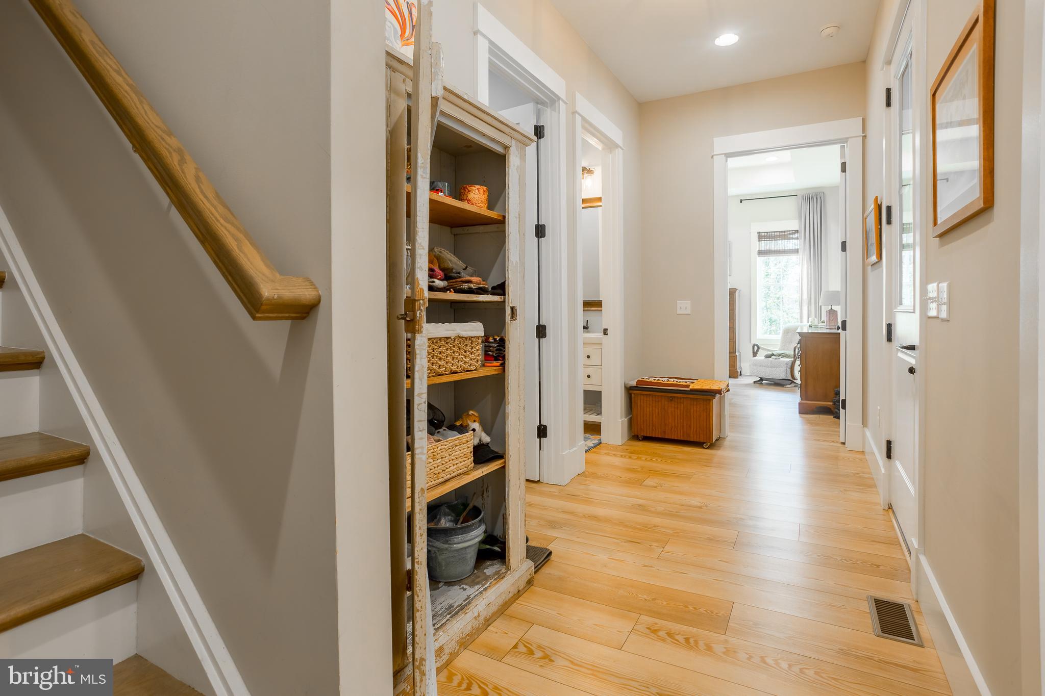 10 Haven Drive Georgetown, DE 19947 - Photo 42 of 76 a view of a hallway with wooden floor and furniture
