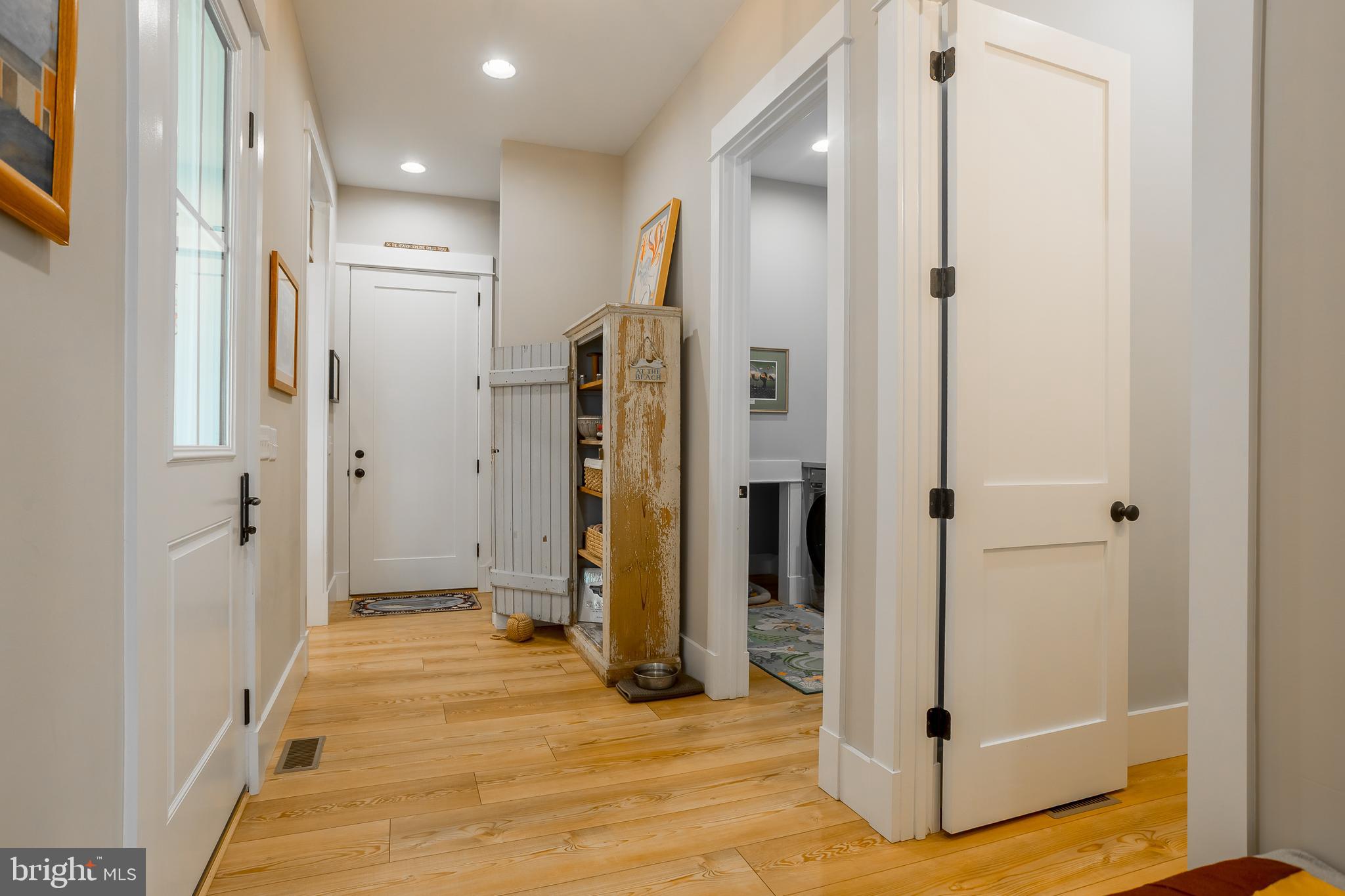 10 Haven Drive Georgetown, DE 19947 - Photo 46 of 76 a view of a hallway with wooden floor and cabinet