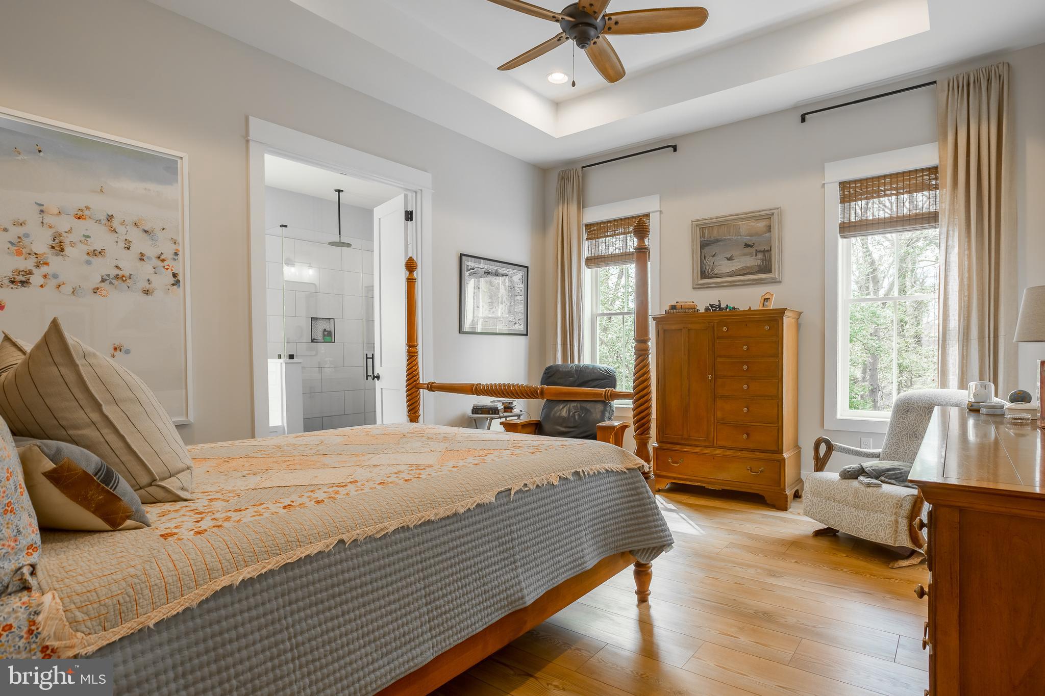 10 Haven Drive Georgetown, DE 19947 - Photo 47 of 76 a bedroom with a bed and wooden floor