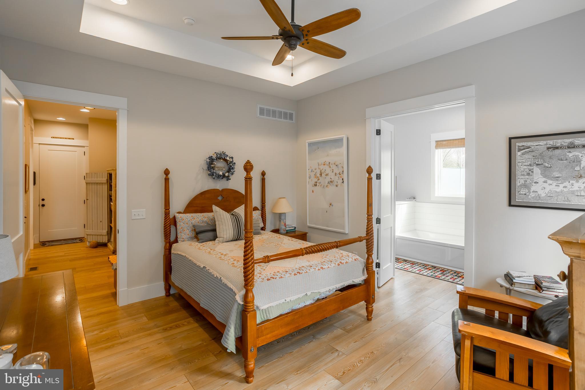 10 Haven Drive Georgetown, DE 19947 - Photo 48 of 76 a bedroom with a bed and wooden floor