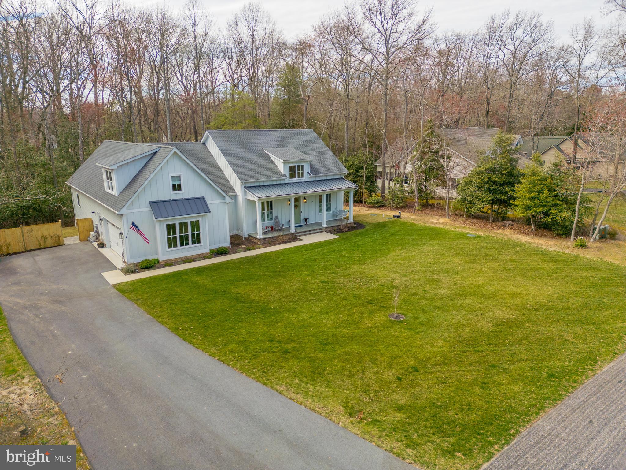 10 Haven Drive Georgetown, DE 19947 - Photo 5 of 76 a front view of a house with a garden and yard