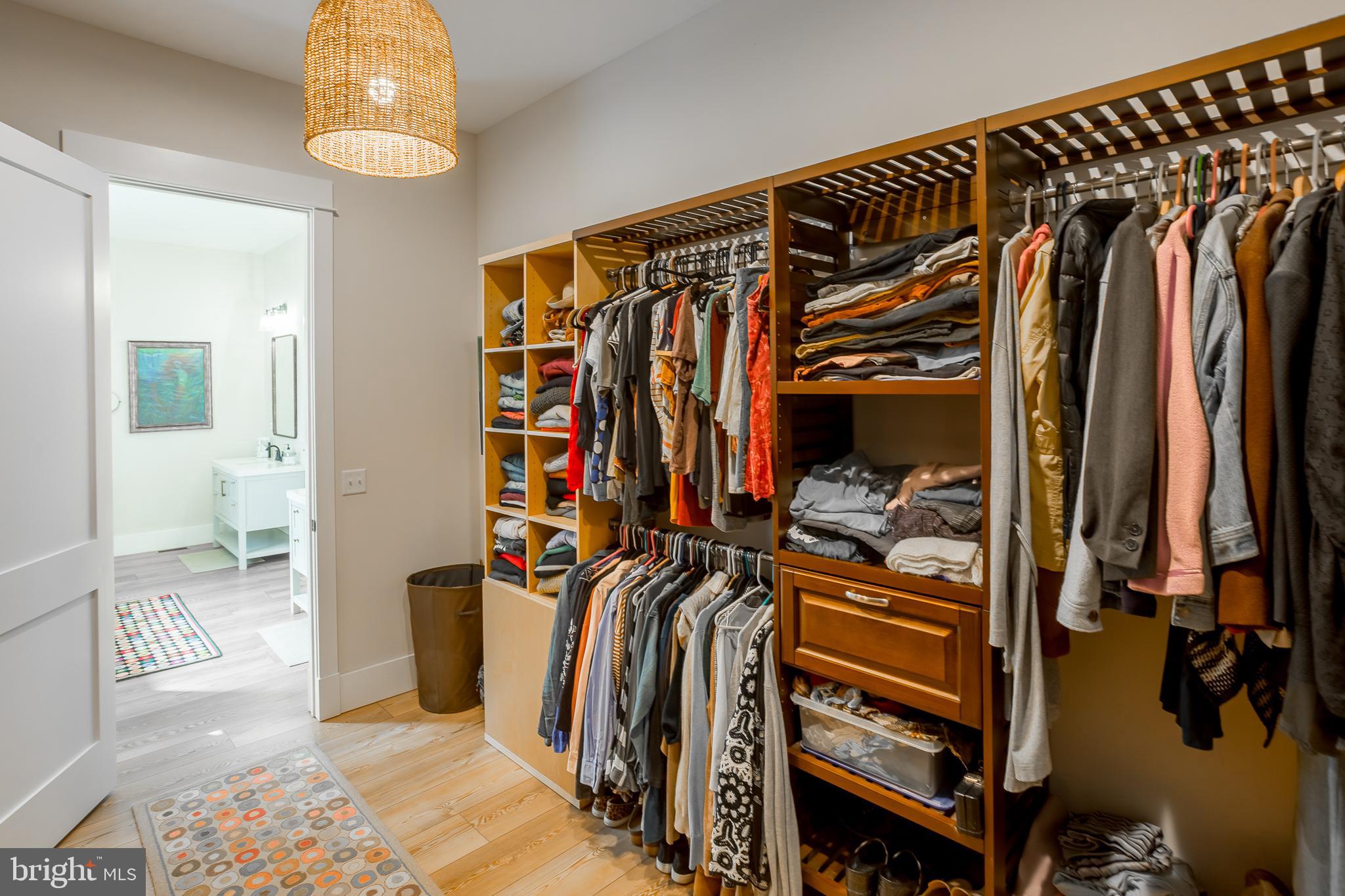 10 Haven Drive Georgetown, DE 19947 - Photo 54 of 76 a view of walk in closet with clothes and shoes