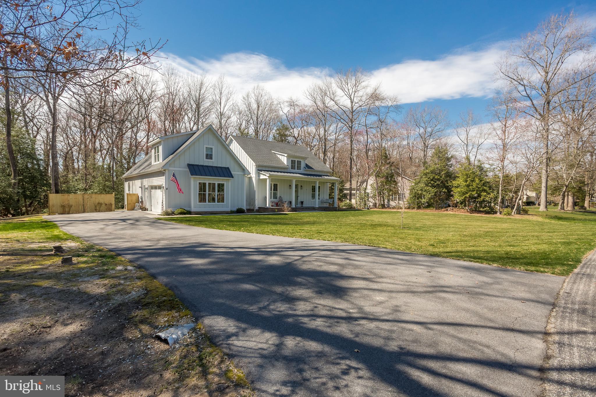 10 Haven Drive Georgetown, DE 19947 - Photo 10 of 76 a view of a house with a big yard and large trees