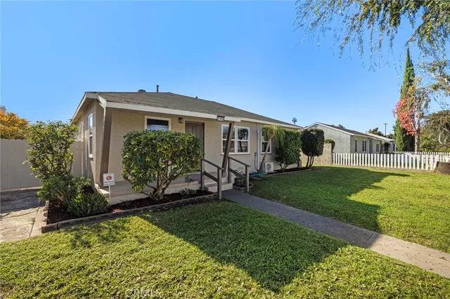 a front view of a house with a garage