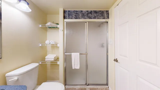 a bathroom with a toilet and a sink