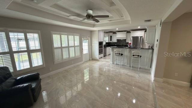 633 Spring Oaks Boulevard Altamonte Springs, FL 32714 - Photo 11 of 37 a view of a livingroom with furniture window and wooden floor
