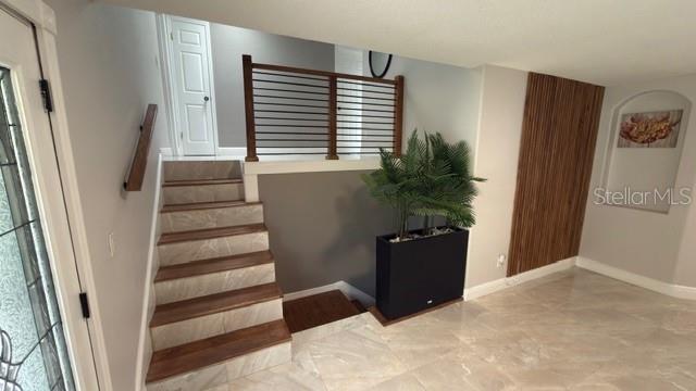 633 Spring Oaks Boulevard Altamonte Springs, FL 32714 - Photo 15 of 37 a view of entryway with stairs