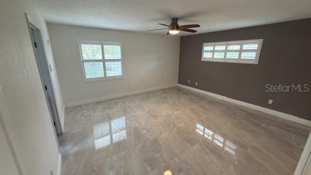 633 Spring Oaks Boulevard Altamonte Springs, FL 32714 - Photo 17 of 37 a view of an empty room with a window